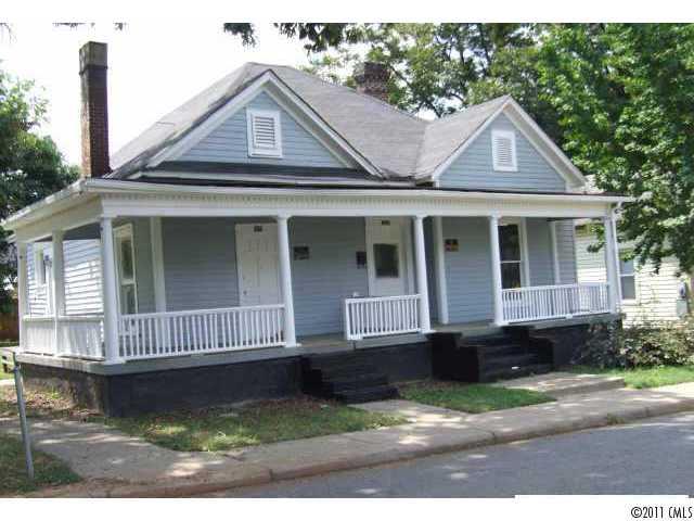 306 Mill Road Charlotte, NC 28216 - Photo 1 of 1 a front view of a house with a yard