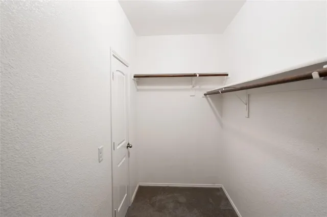 a bathroom with a sink vanity and mirror