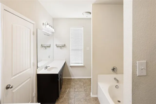 a bathroom with a bathtub