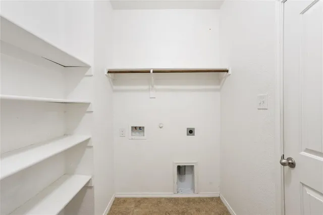 a storage room with washer and dryer
