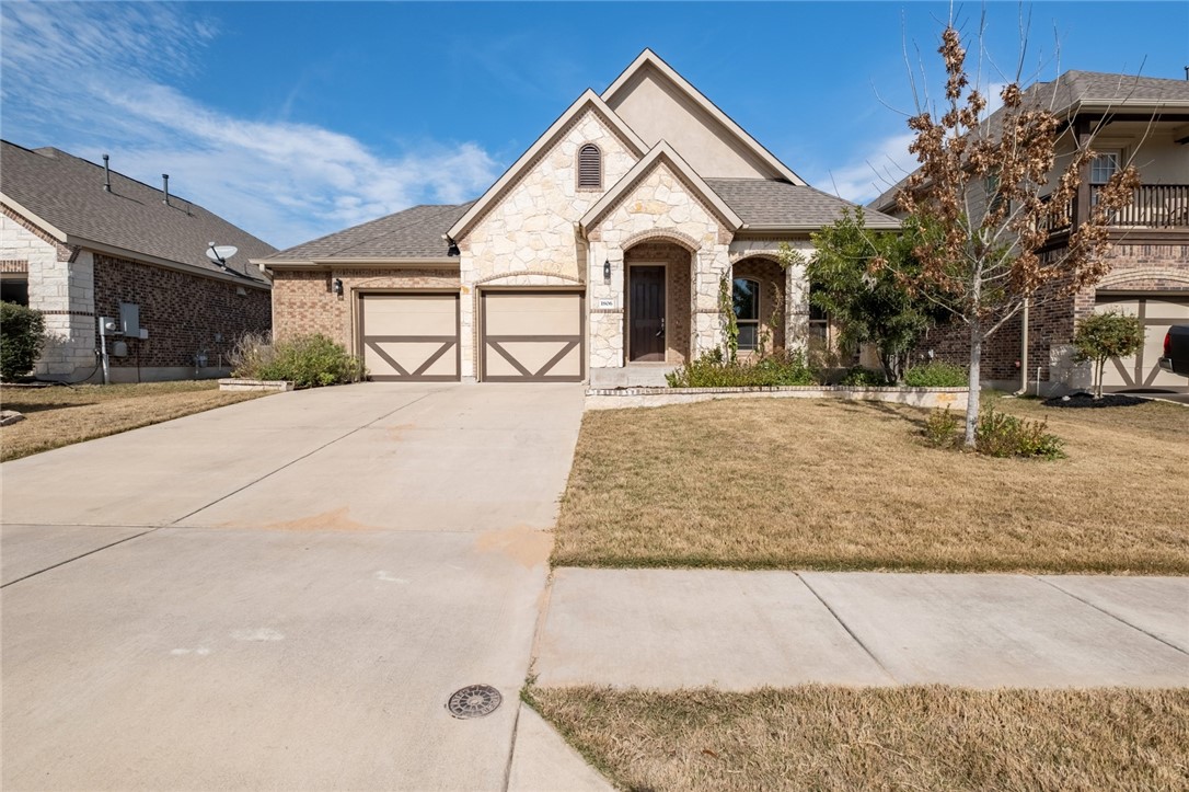 1806 Grebe Drive Pflugerville, TX 78660 - Photo 1 of 1 a view of a white house with a outdoor space