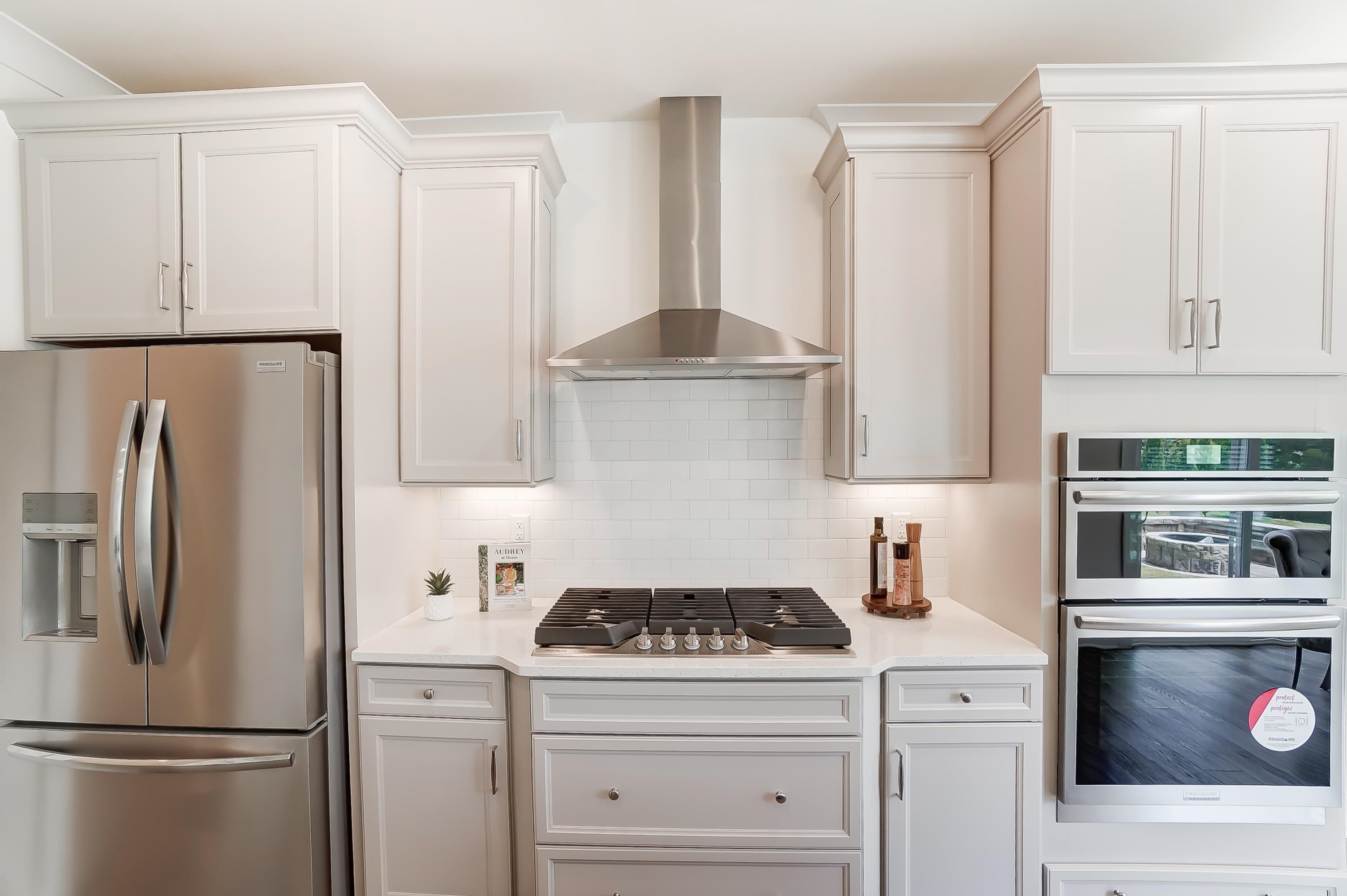 3450 Piedmont Drive Raleigh, NC 27604 - Photo 12 of 34 a kitchen with appliances a refrigerator and cabinets