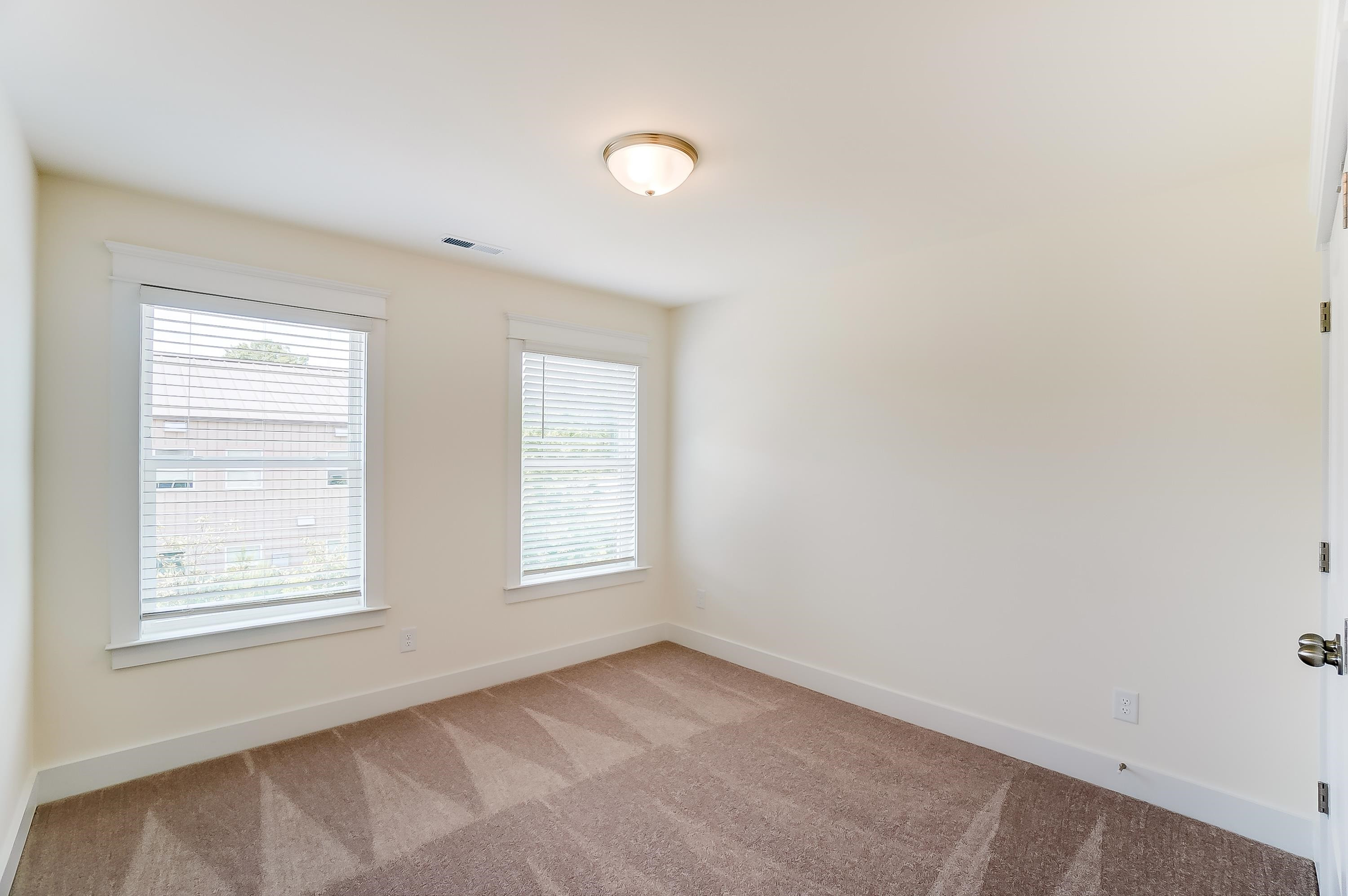 3450 Piedmont Drive Raleigh, NC 27604 - Photo 28 of 34 an empty room with windows