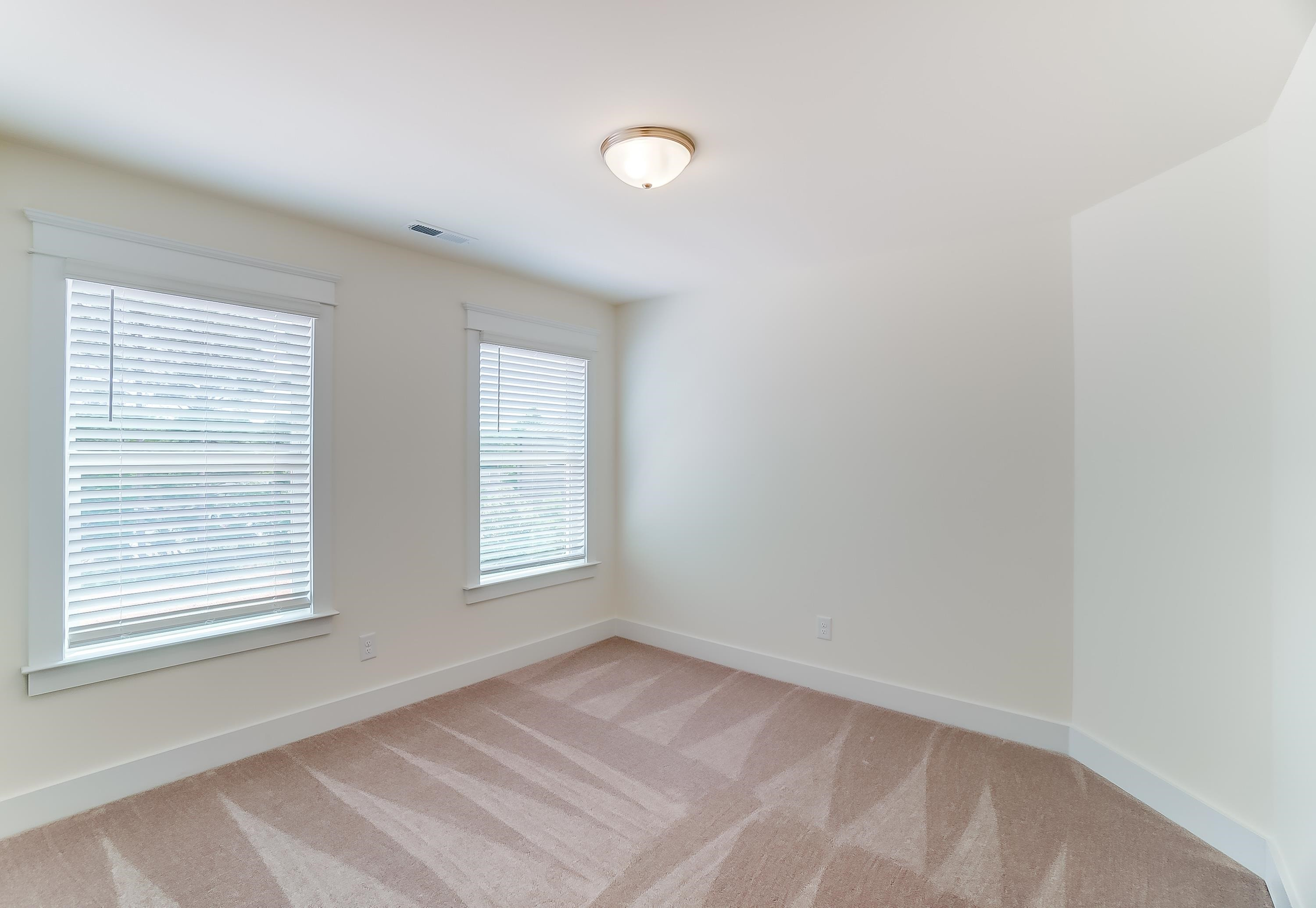 3450 Piedmont Drive Raleigh, NC 27604 - Photo 31 of 34 an empty room with windows