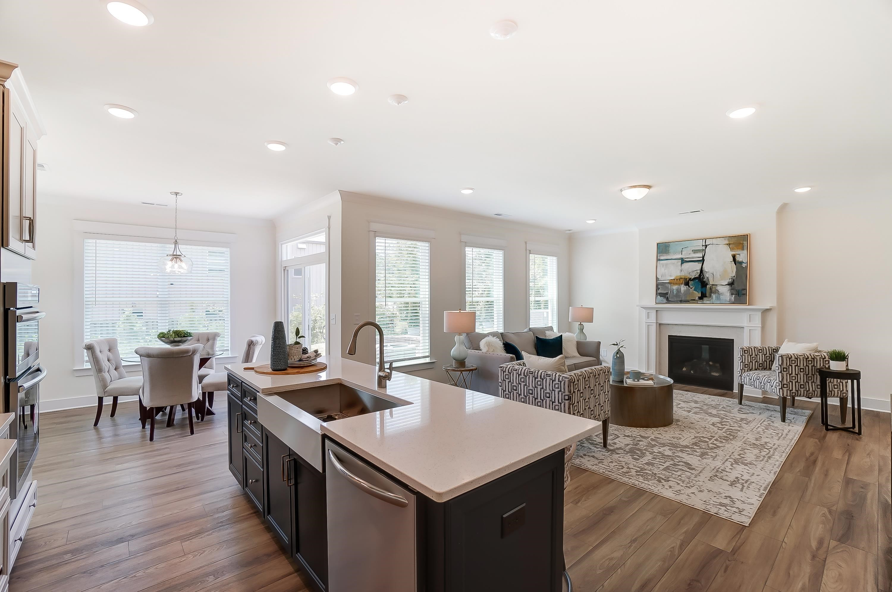 3450 Piedmont Drive Raleigh, NC 27604 - Photo 10 of 34 a large kitchen with sink a counter space and living room