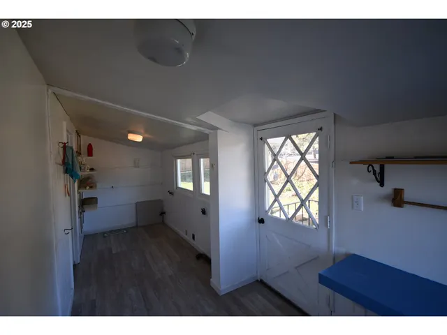 a view of an empty room and window