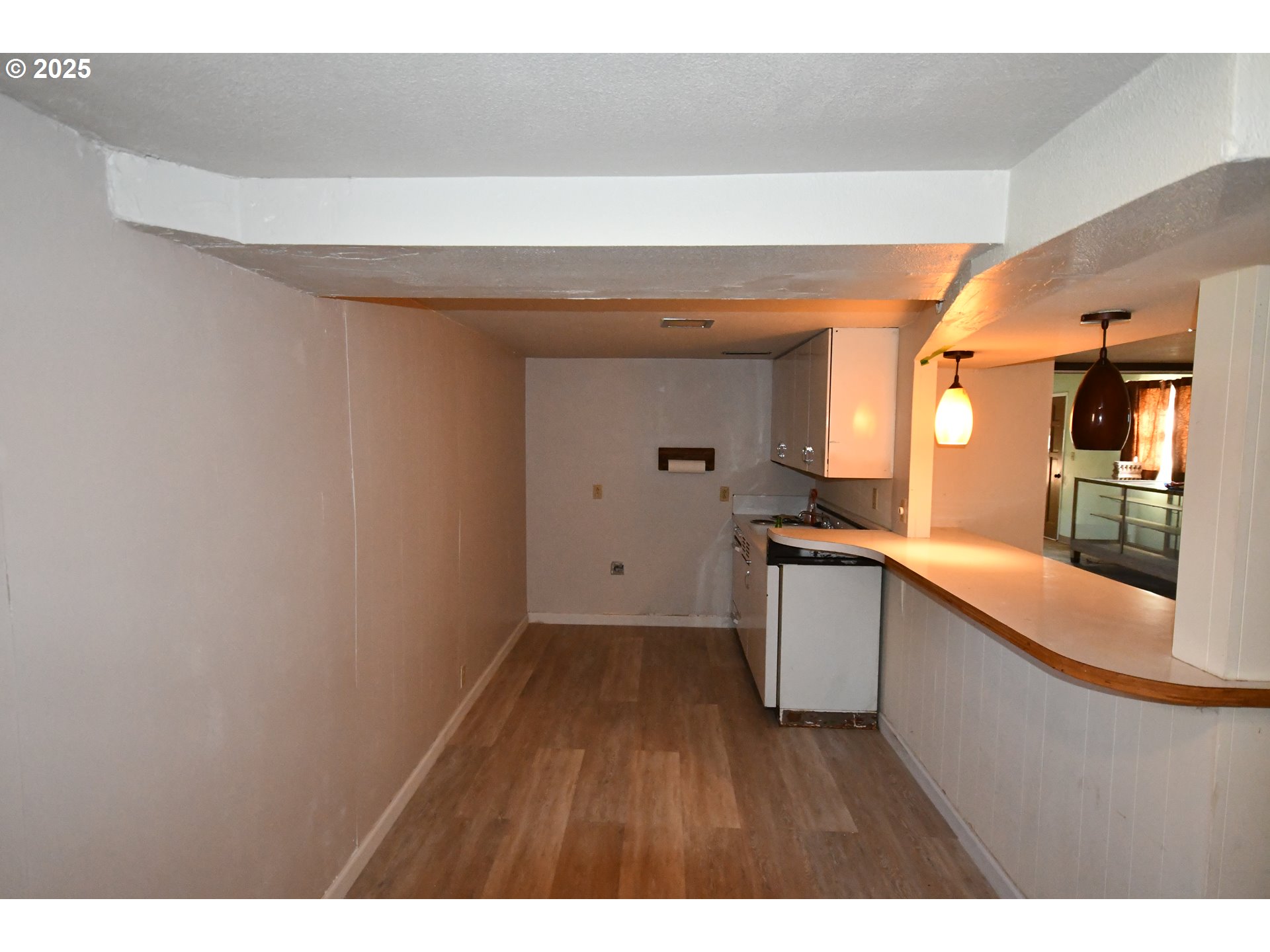 4233 Chenoweth Road The Dalles, OR 97058 - Photo 24 of 46 a kitchen with a wooden floor