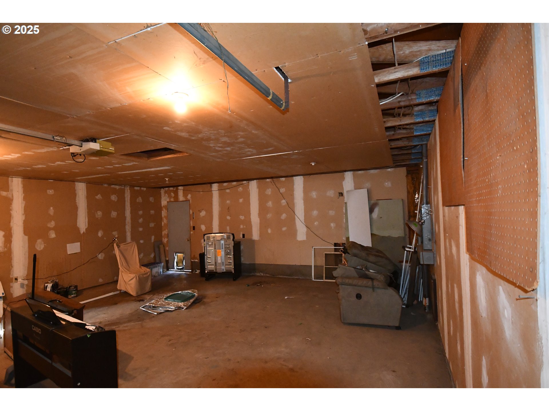 4233 Chenoweth Road The Dalles, OR 97058 - Photo 31 of 46 a room with gym equipment and a large window