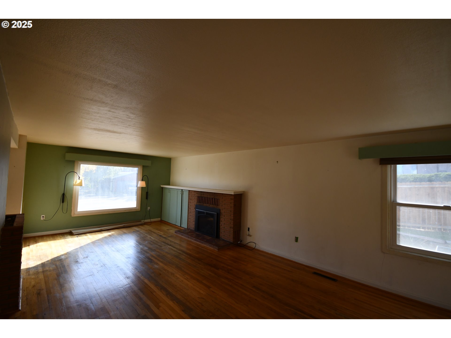4233 Chenoweth Road The Dalles, OR 97058 - Photo 32 of 46 a view of empty room with wooden floor and fan