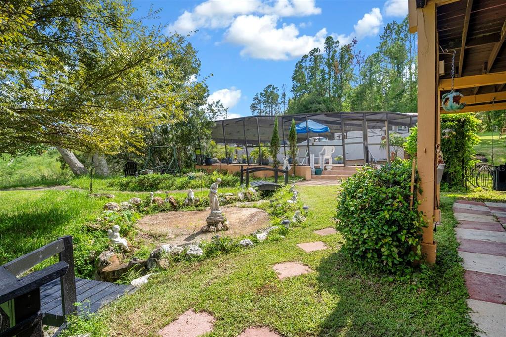 25927 Old Spring Lake Road Brooksville, FL 34601 - Photo 47 of 60 a view of an outdoor space