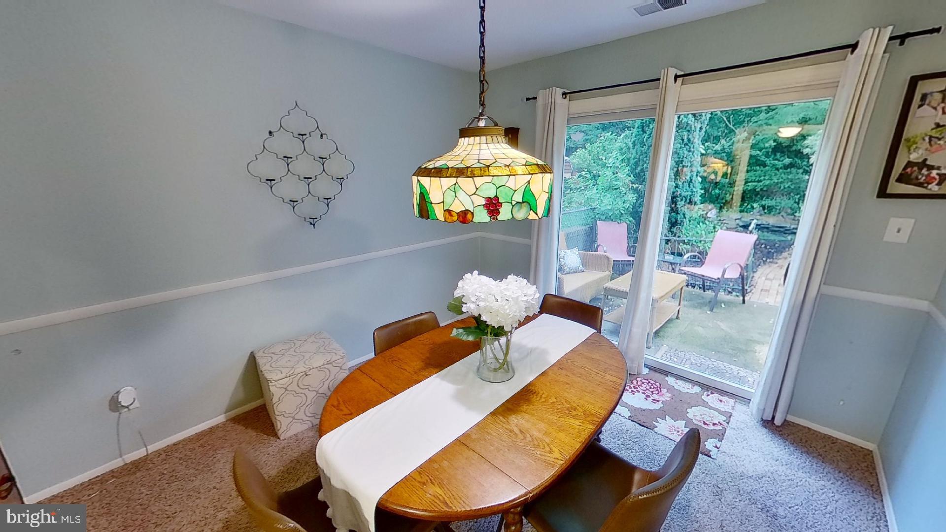Dining Room - Sliders open to patio