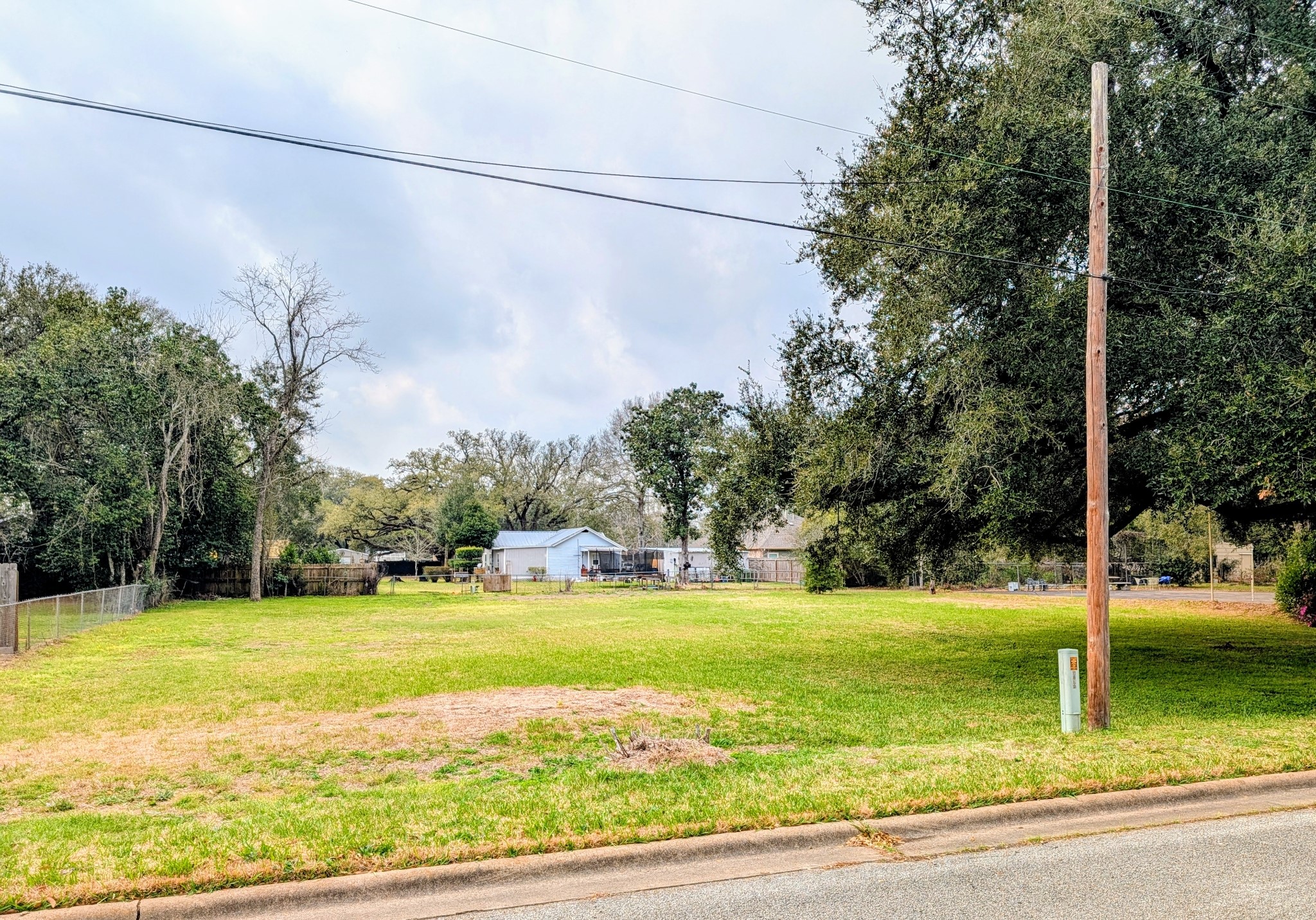 0 Yupon Street Liberty, TX 77575 - Photo 3 of 3 a view of a water fountain and a big yard