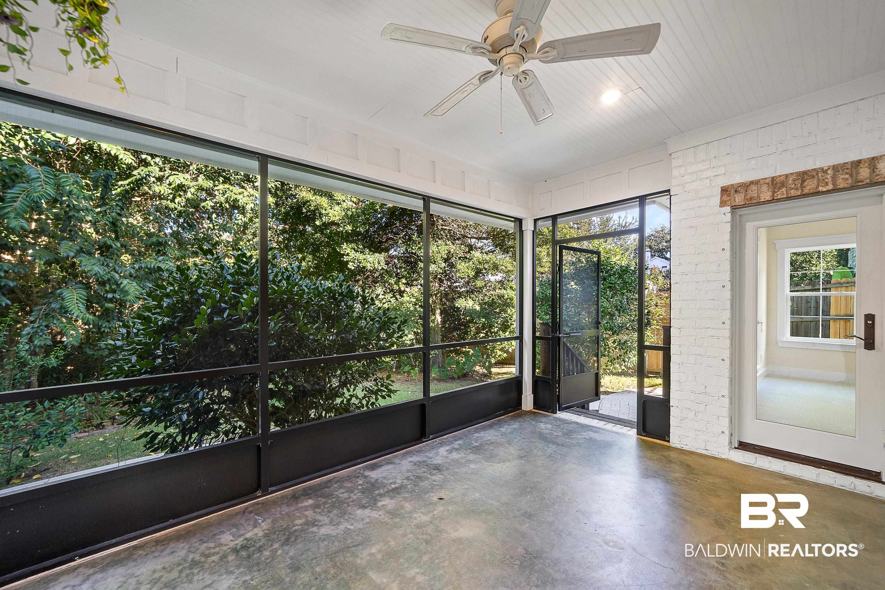 356 Liberty Street Fairhope, AL 36532 - Photo 31 of 39 Unfurnished sunroom with a ceiling fan