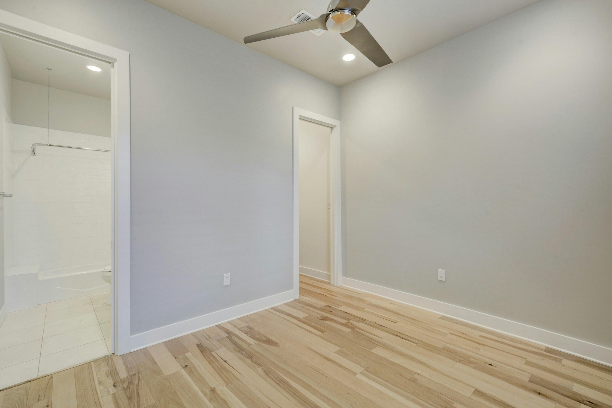 2314 Enfield Road, Unit 202 Austin, TX 78703 - Photo 14 of 20 Secondary bedroom with direct access to main bathroom.