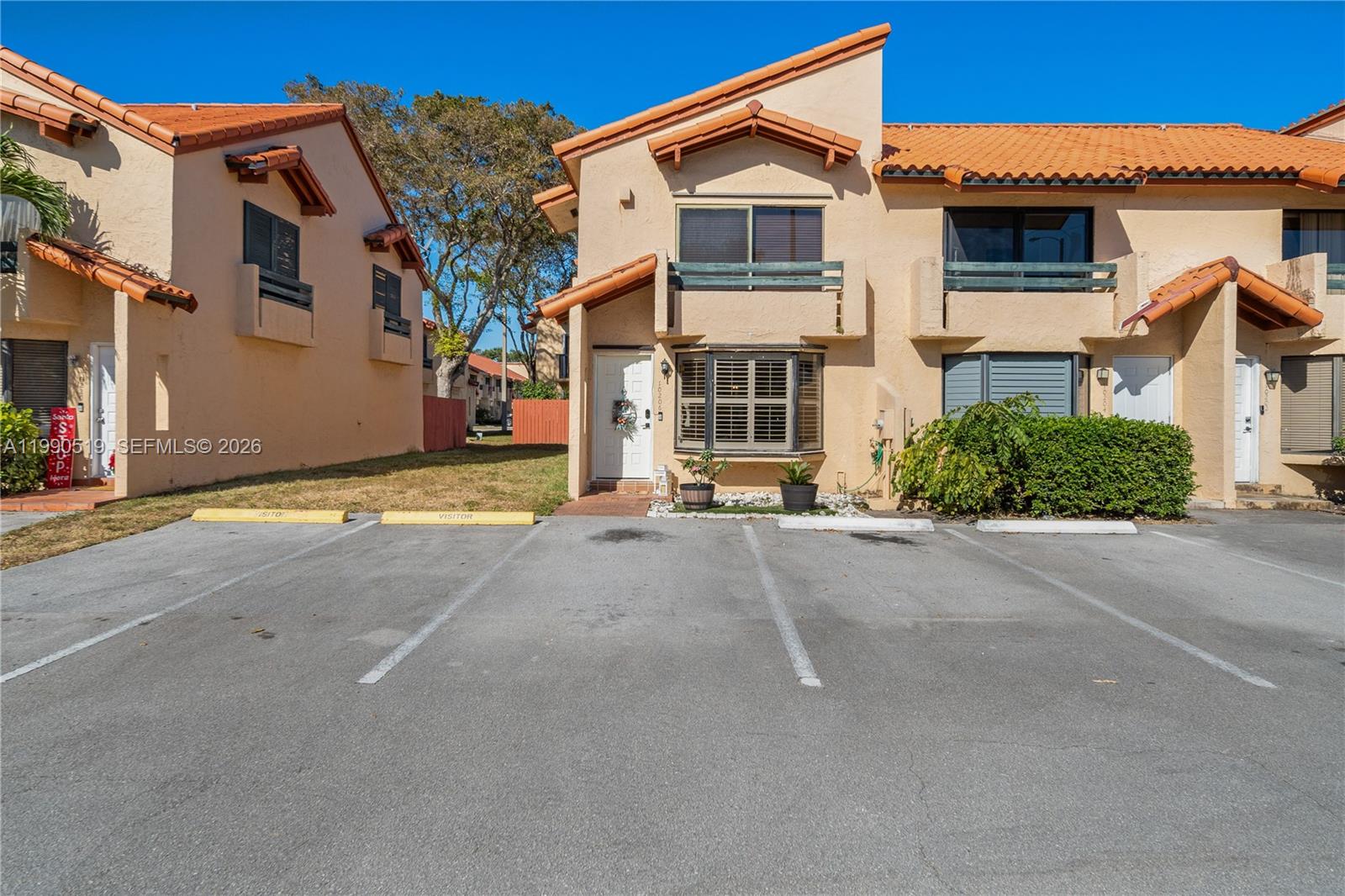 10206 Southwest 77th Court Miami, FL 33156 - Photo 1 of 28 a view of a house with a street
