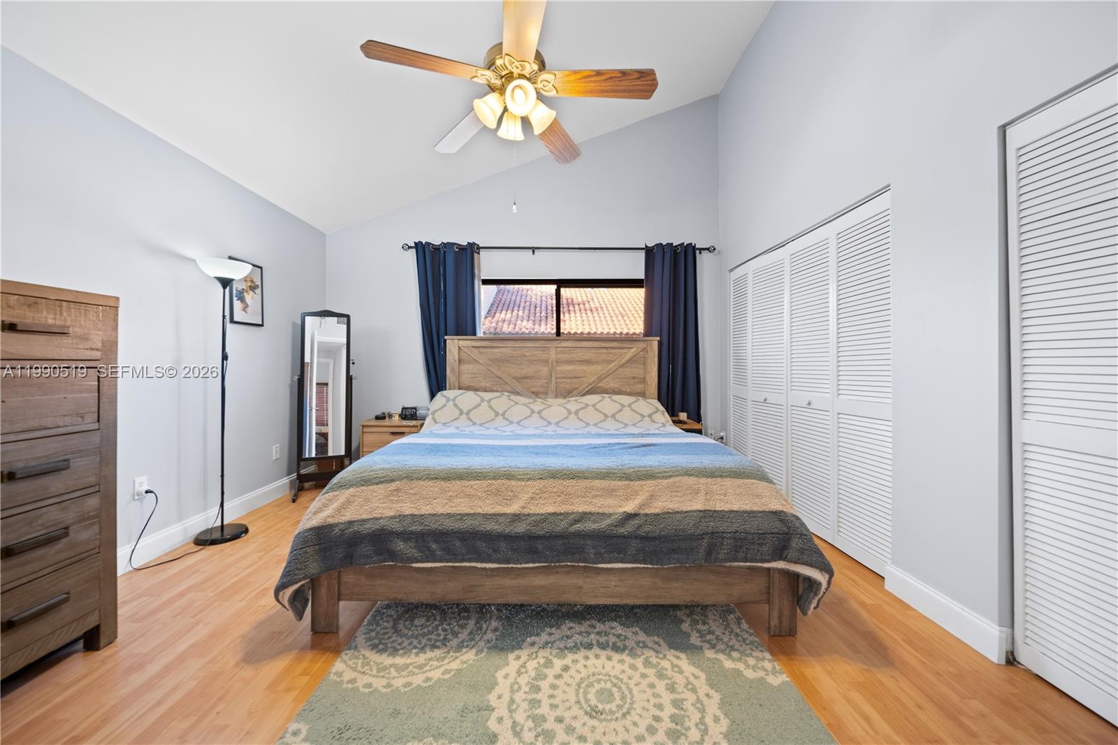 10206 Southwest 77th Court Miami, FL 33156 - Photo 14 of 28 a bedroom with a bed and a window