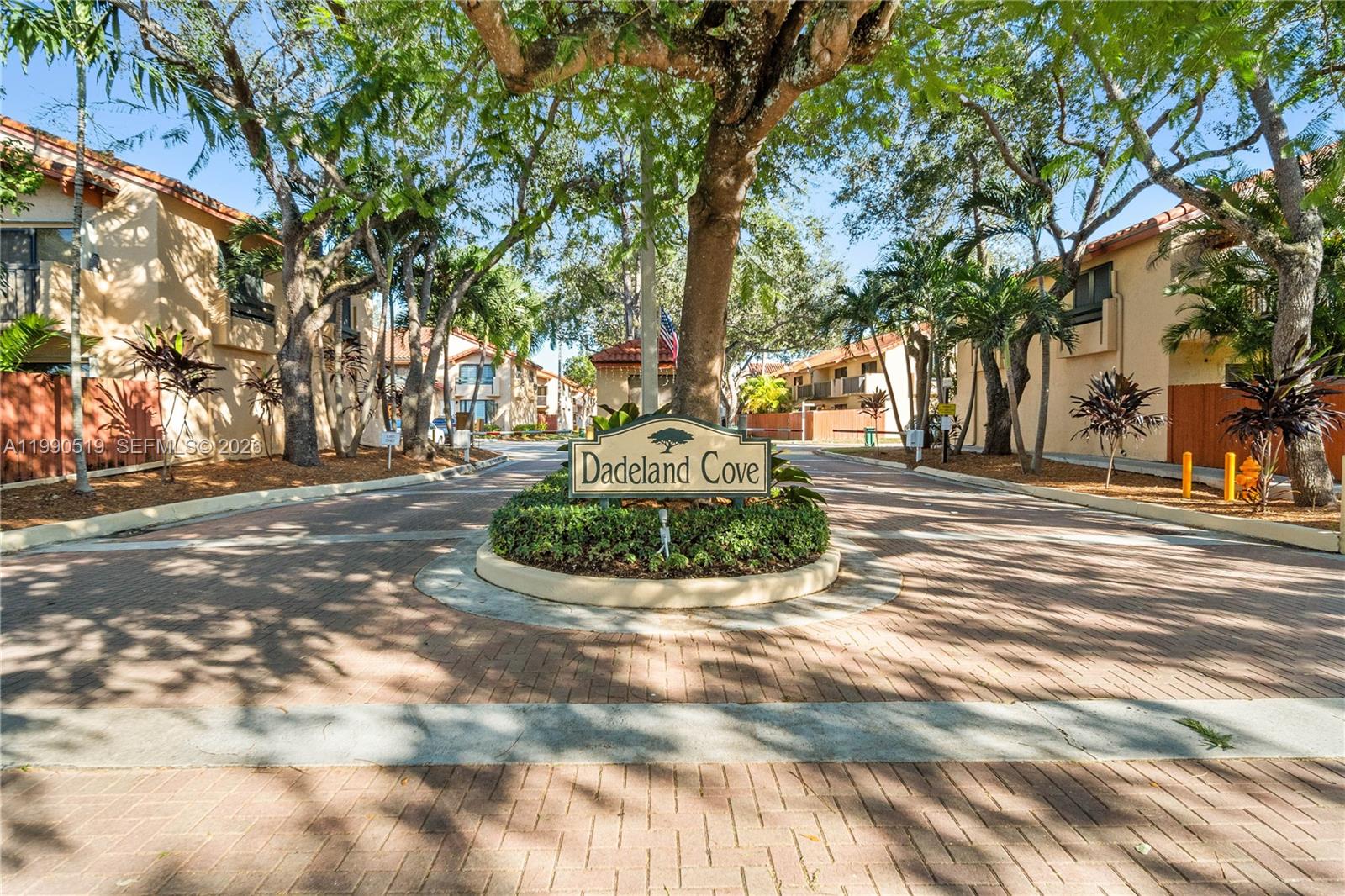 10206 Southwest 77th Court Miami, FL 33156 - Photo 27 of 28 a view of road with trees
