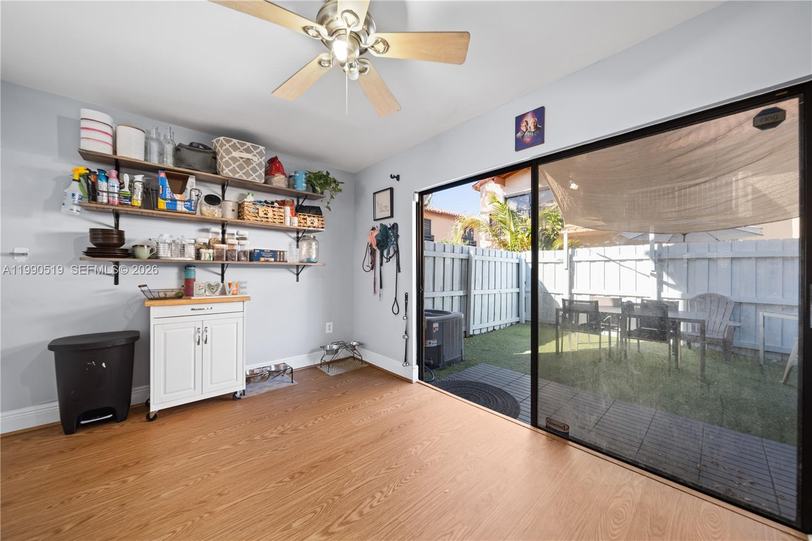 10206 Southwest 77th Court Miami, FL 33156 - Photo 9 of 28 a view of a hallway with workspace and a window