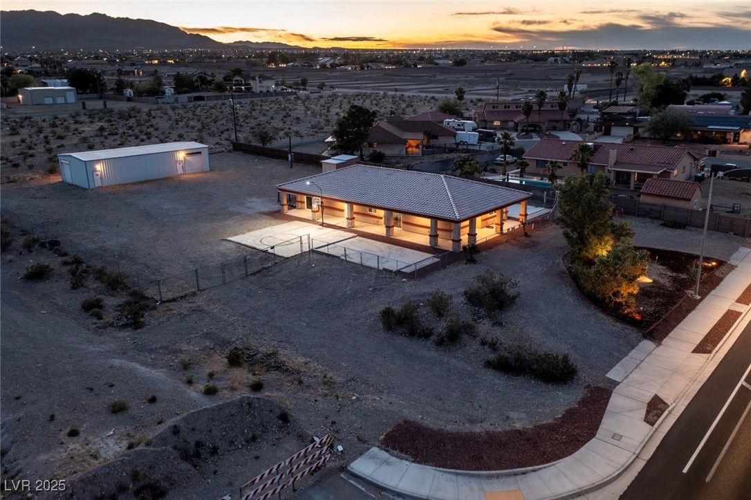 5315 North Fort Apache Road Las Vegas, NV 89149 - Photo 12 of 46 Aerial perspective of South East Corner, which shows Secondary Entrance/Exit to Fisher Road.