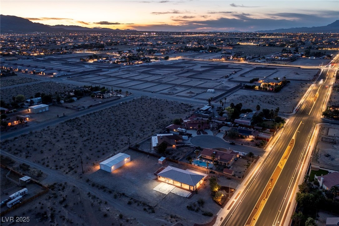 5315 North Fort Apache Road Las Vegas, NV 89149 - Photo 13 of 46 Aerial View of Property, where Massive Brand New Homes Development is currently taking place just North of the Property on Fort Apache & Ann Road. In a nutshell, This Property is currently being surrounded with Smaller Lot Size Brand New Homes Construction.