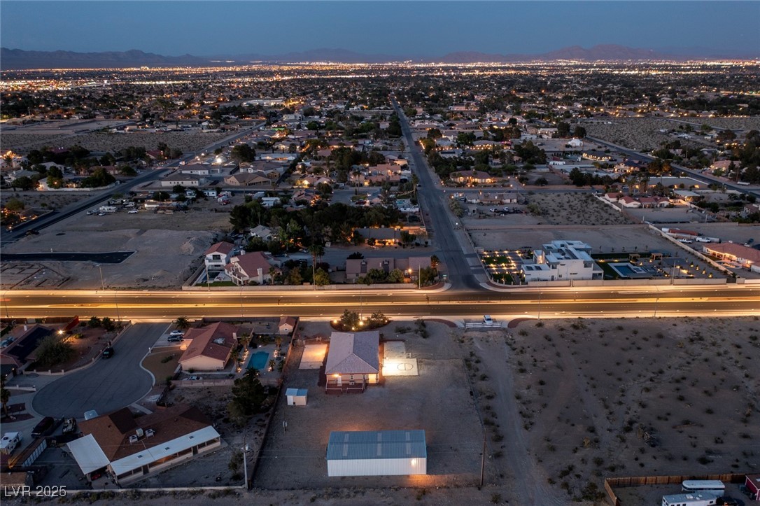 5315 North Fort Apache Road Las Vegas, NV 89149 - Photo 18 of 46 Aerial view straight shot of the West Back Side of Property and surrounding nearby suburban areas.