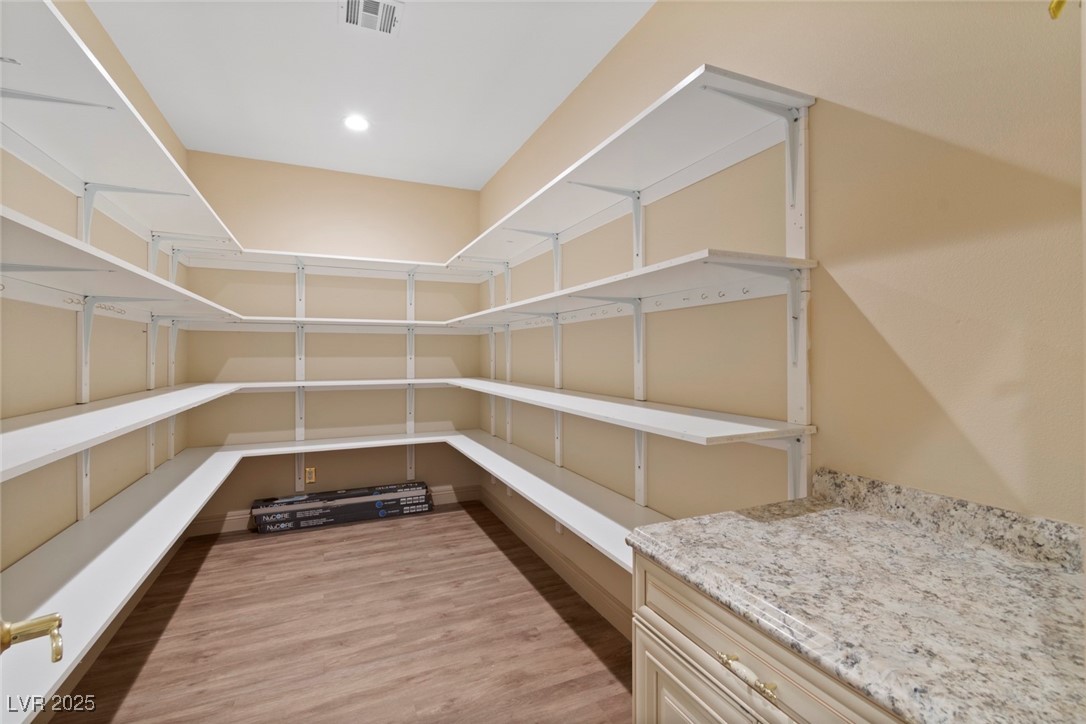 5315 North Fort Apache Road Las Vegas, NV 89149 - Photo 26 of 46 This 3 Bedroom 2 Bath Custom Home, features a Bonus Utility Room 13x7 foot, with Custom Shelving and Extra Storage. A great extra space to store away your family heirlooms.