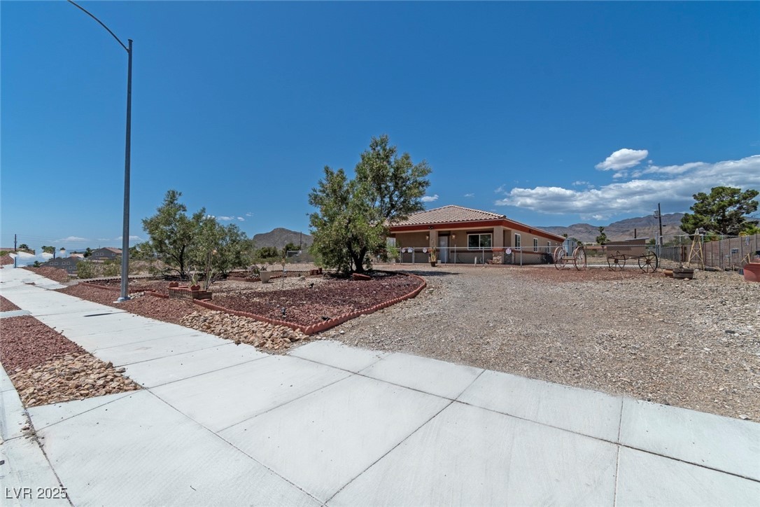5315 North Fort Apache Road Las Vegas, NV 89149 - Photo 35 of 46 This property features a Horseshoe Entrance. Two Entry/Exits from the Front of Home to Fort Apache Road.
