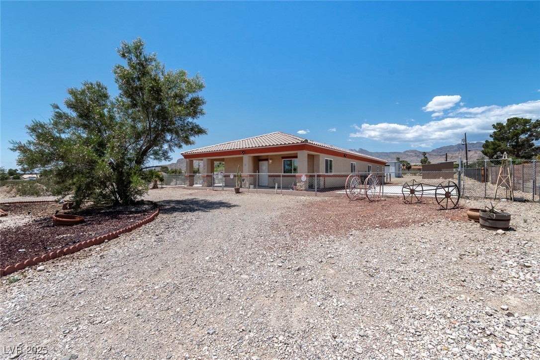 5315 North Fort Apache Road Las Vegas, NV 89149 - Photo 36 of 46 Front view of property featuring a Horseshoe Entry.