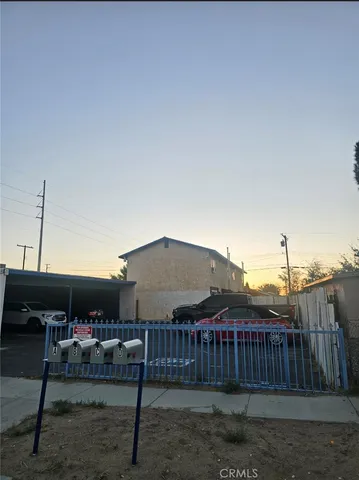 a view of a chairs and tables in the patio