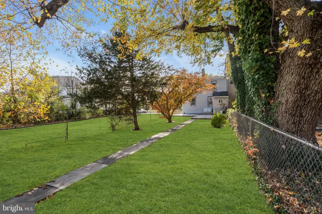 a view of a house with a big yard