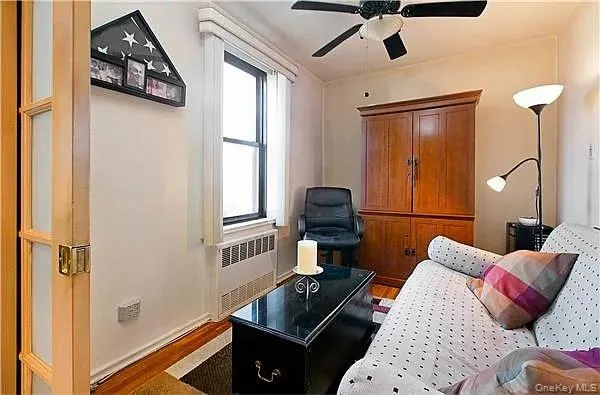 a living room with furniture and a window