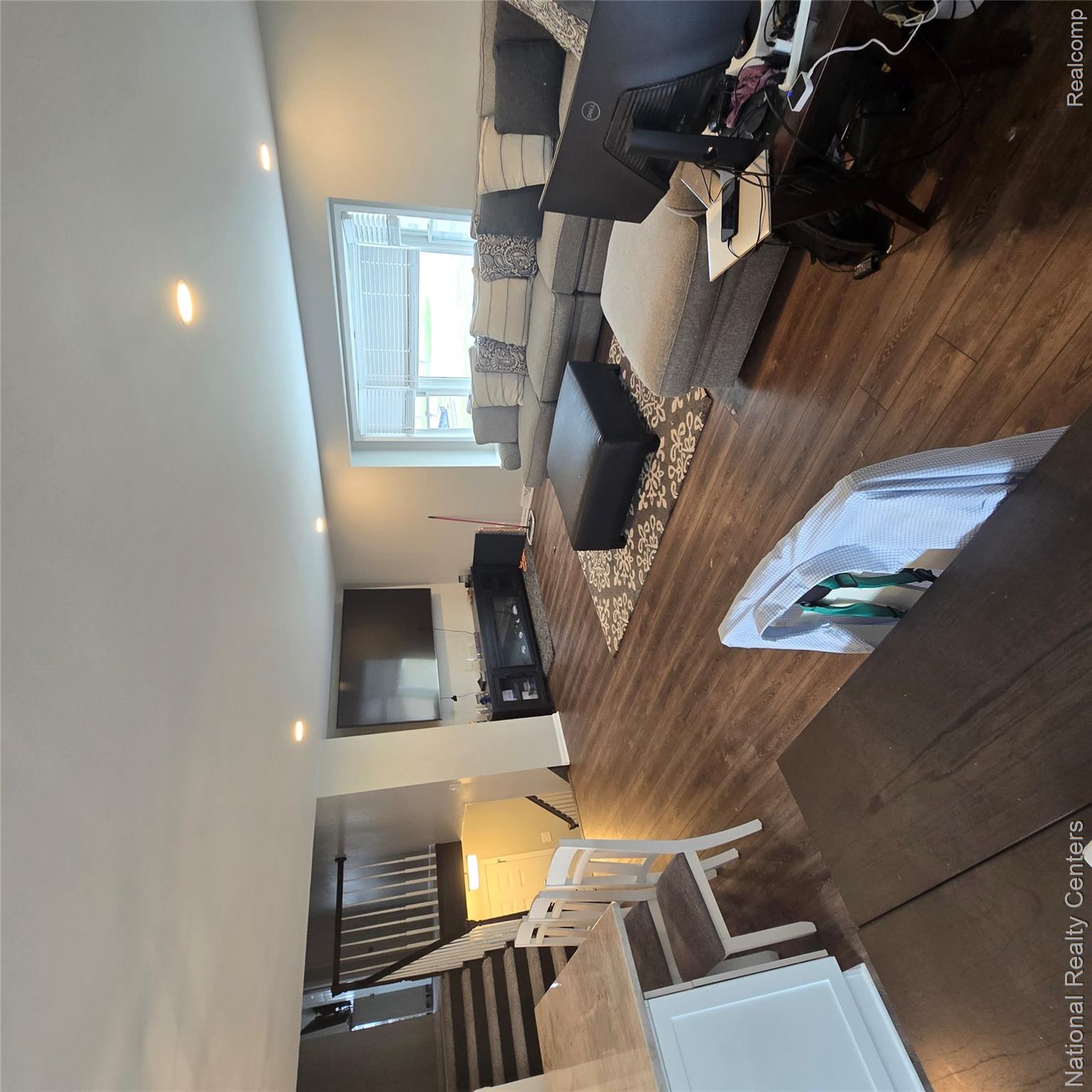 13477 South Horrell Road Fenton, MI 48430 - Photo 6 of 30 Living area featuring dark wood-type flooring and recessed lighting