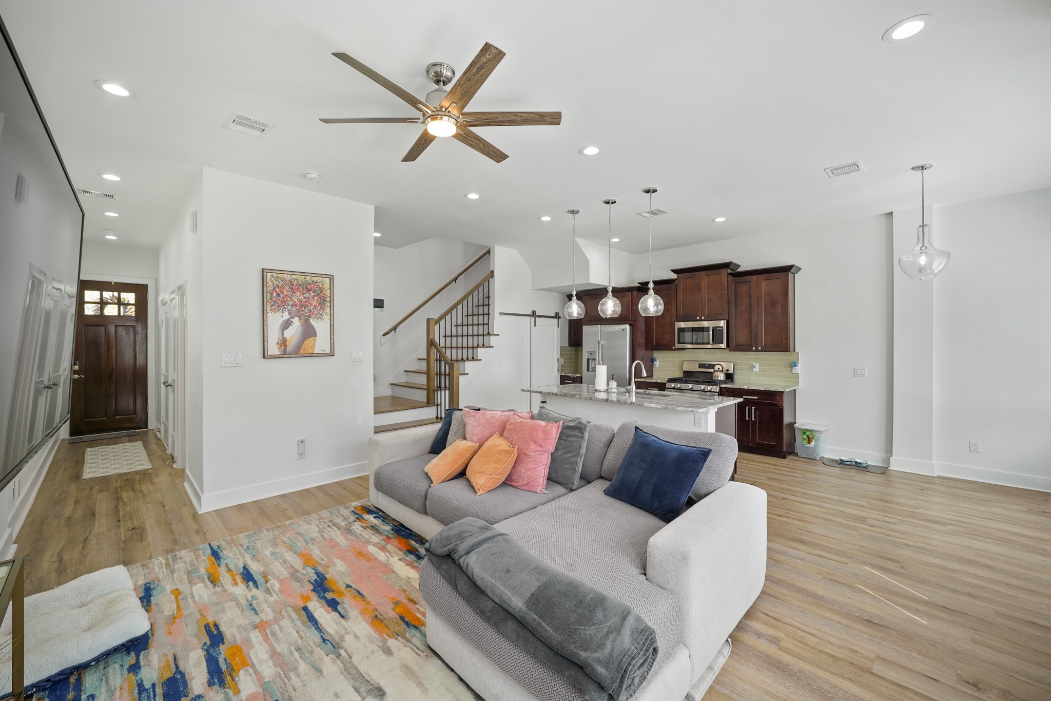 4402 McKinley Street, Unit B Houston, TX 77051 - Photo 21 of 21 a living room with furniture and kitchen view