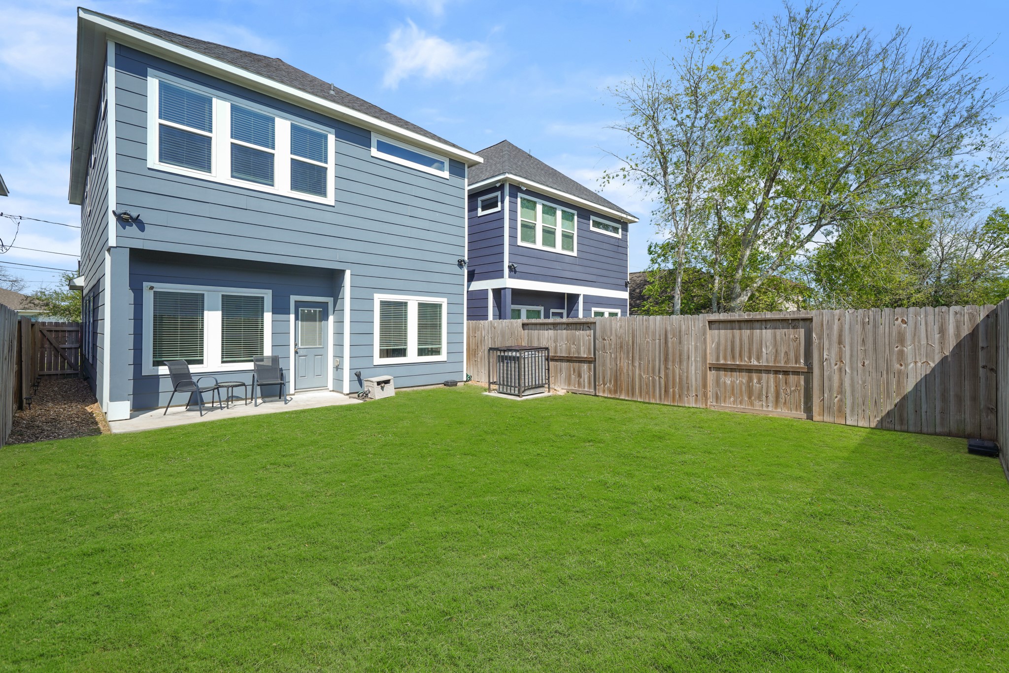 4402 McKinley Street, Unit B Houston, TX 77051 - Photo 17 of 21 a view of a house with backyard and porch