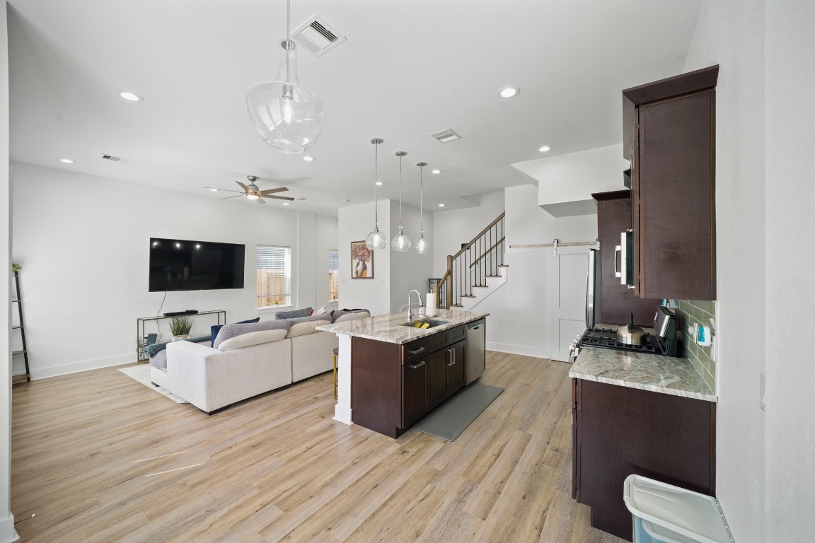 4402 McKinley Street, Unit B Houston, TX 77051 - Photo 5 of 21 Upgraded flooring throughout the 1st floor