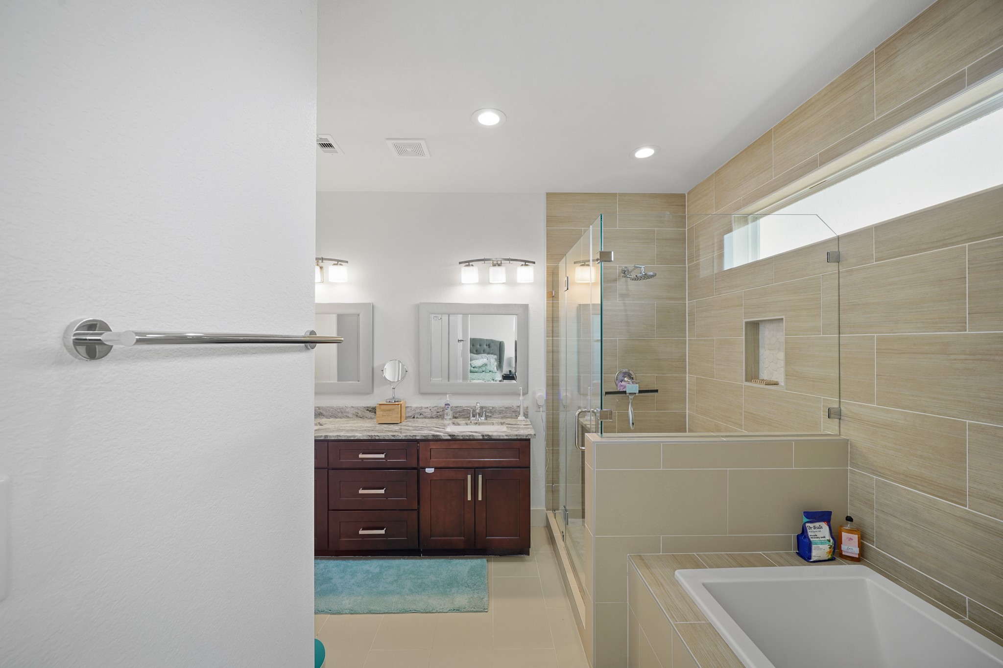 4402 McKinley Street, Unit B Houston, TX 77051 - Photo 9 of 21 a bathroom with a granite countertop sink a toilet and shower