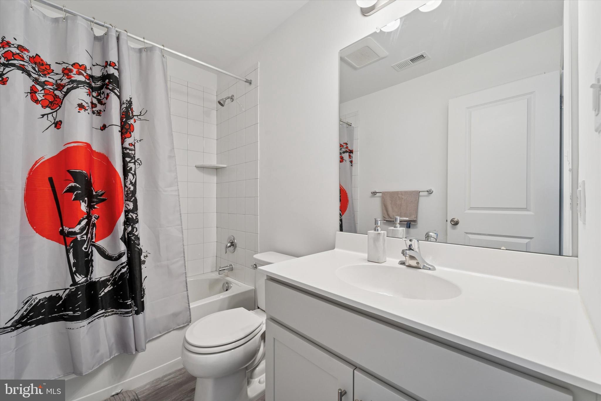 65 Aviary Road Thorofare, NJ 08086 - Photo 11 of 16 a bathroom with a sink toilet and shower