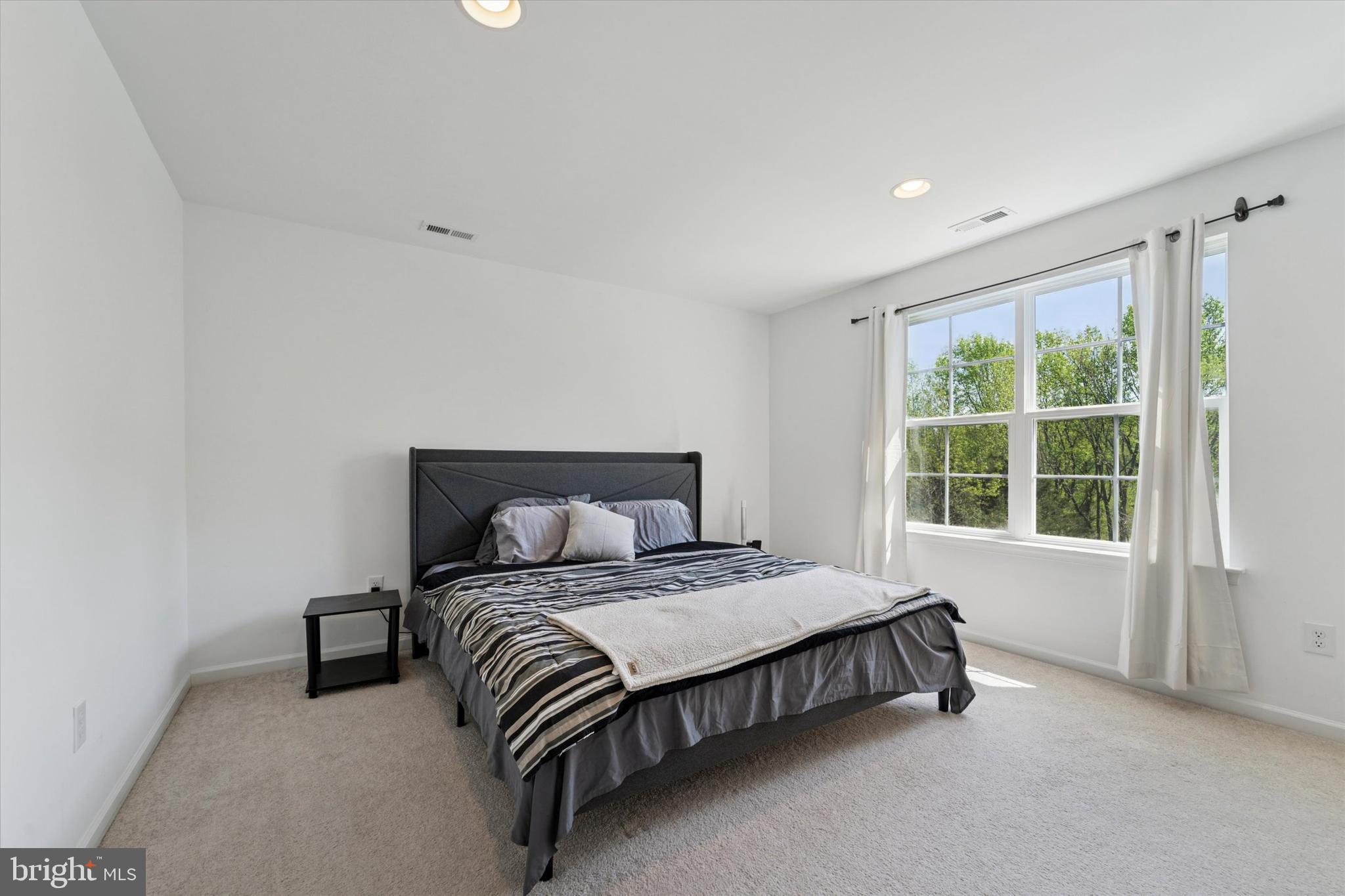 65 Aviary Road Thorofare, NJ 08086 - Photo 12 of 16 a bedroom with a bed and a window
