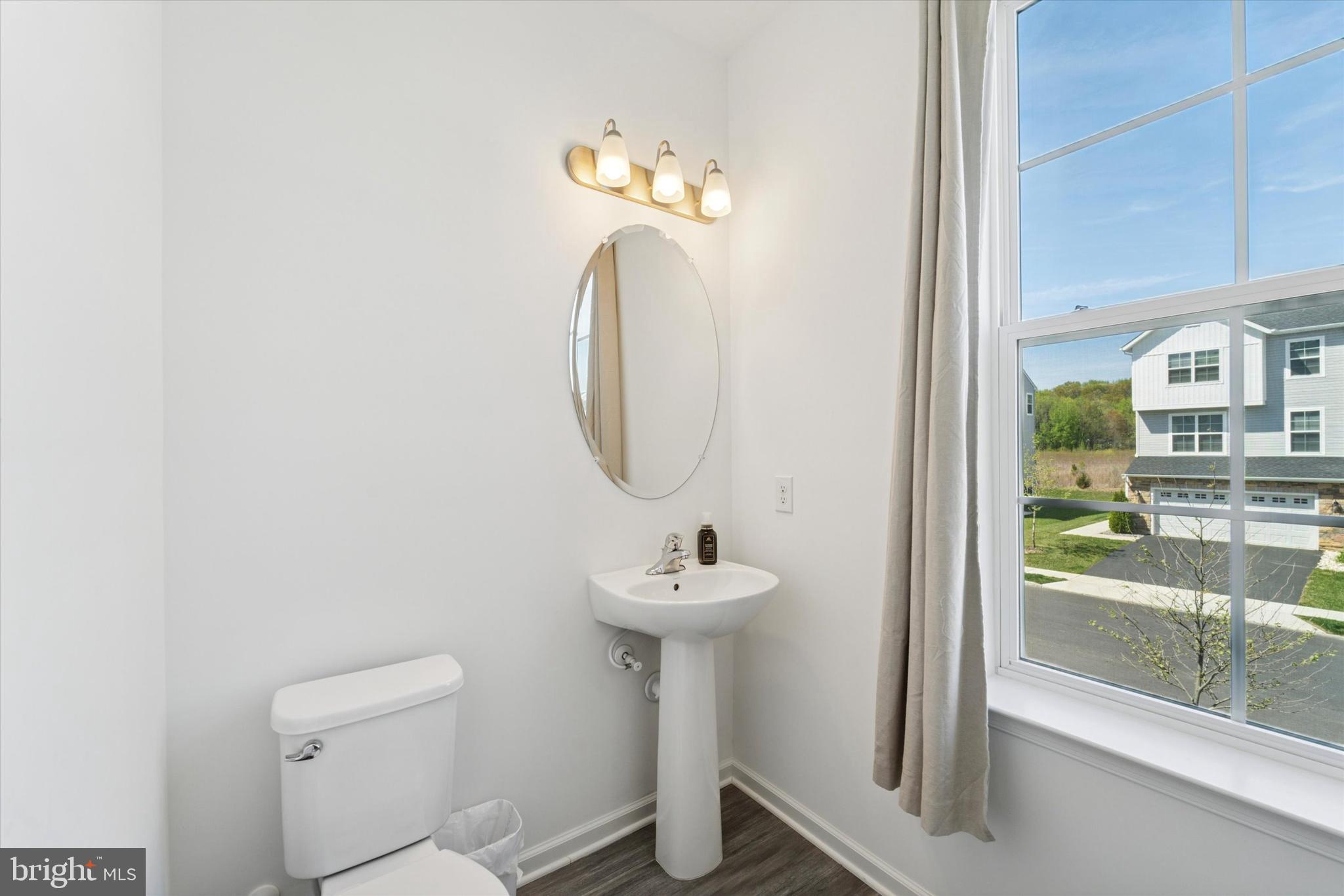 65 Aviary Road Thorofare, NJ 08086 - Photo 5 of 16 a bathroom with a sink and a mirror
