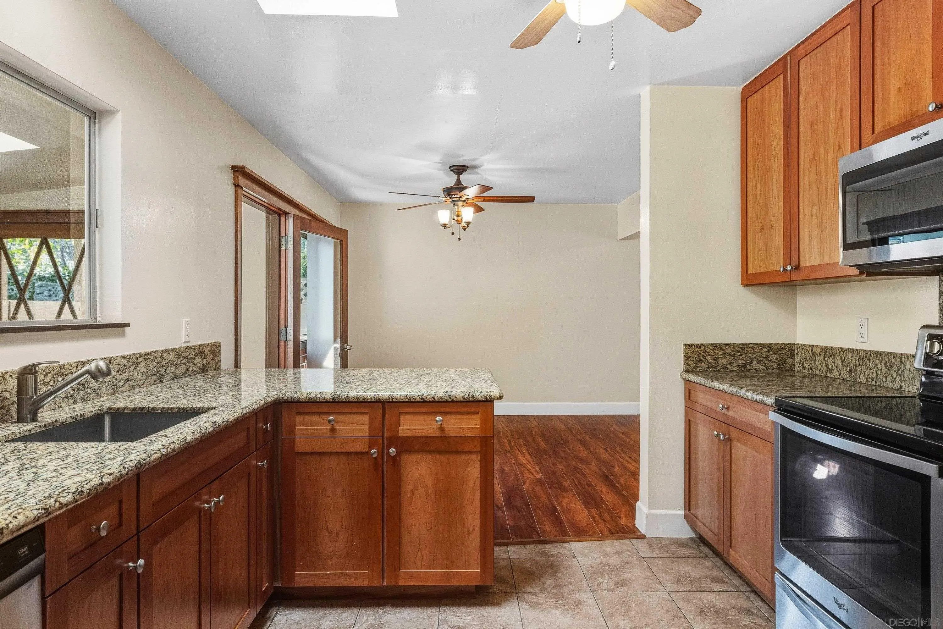 1491 Louise Drive Alpine, CA 91901 - Photo 15 of 45 a kitchen with a sink appliances and cabinets