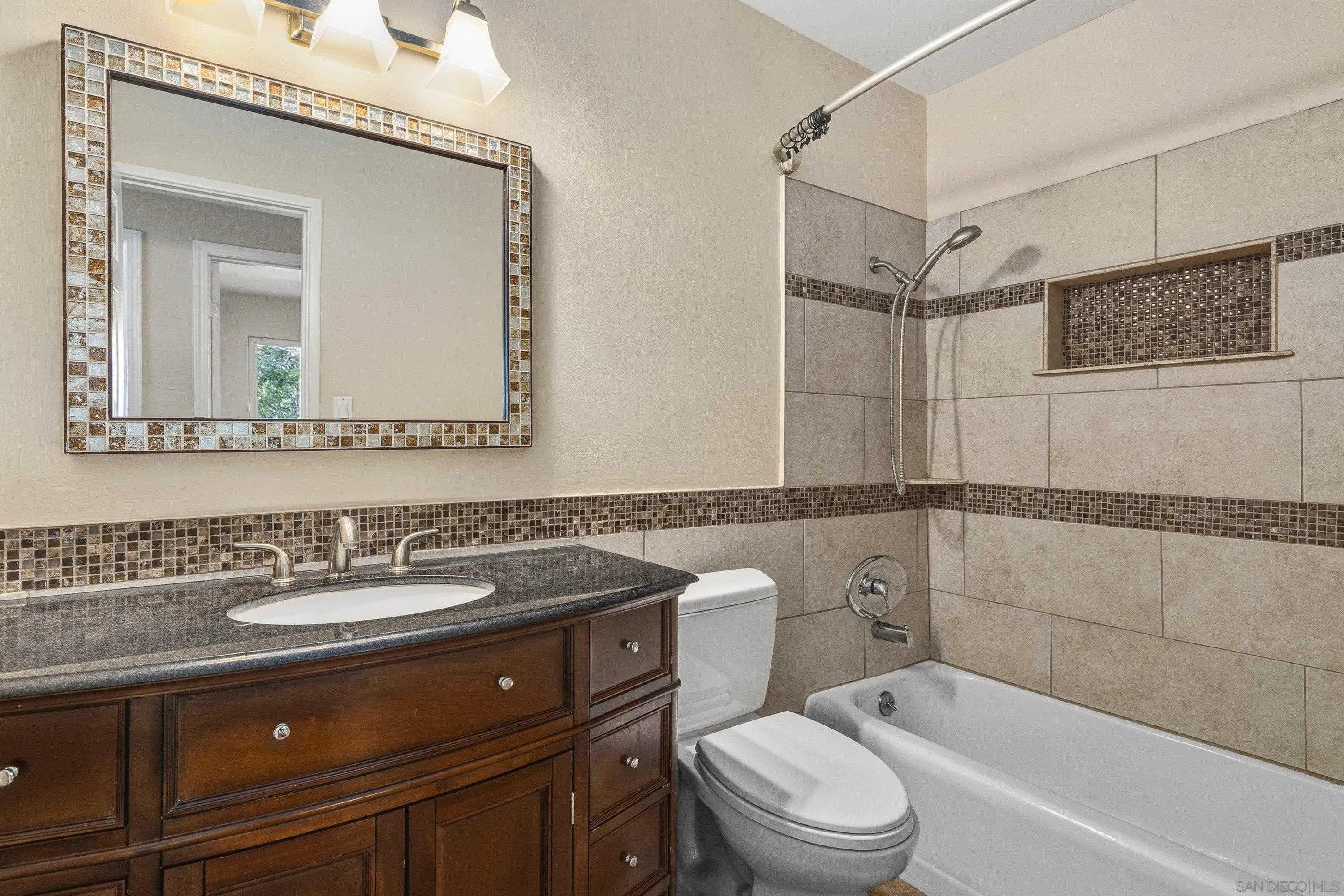 1491 Louise Drive Alpine, CA 91901 - Photo 25 of 45 a bathroom with a sink a toilet and shower