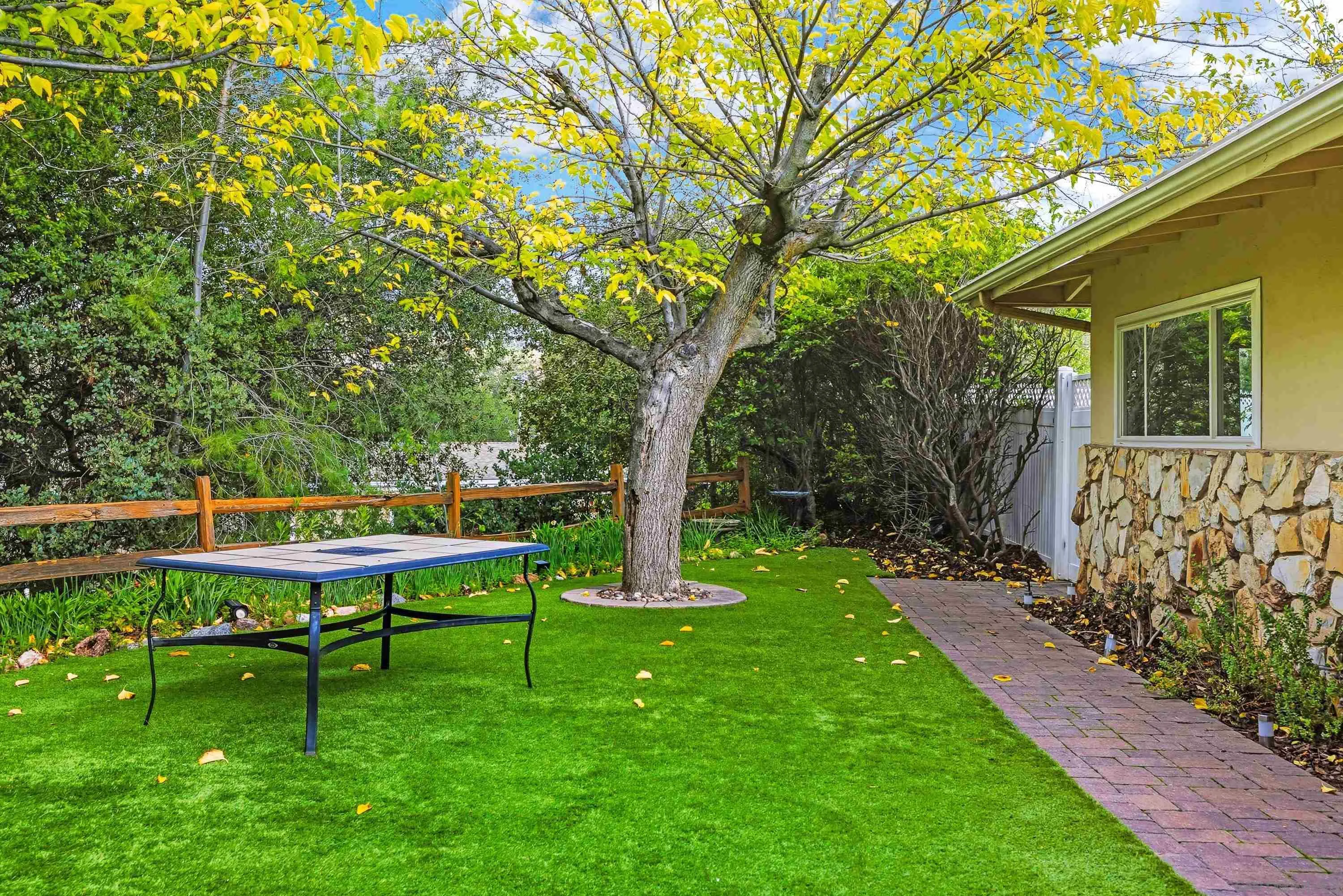 1491 Louise Drive Alpine, CA 91901 - Photo 38 of 45 a view of a chair and table in backyard of the house