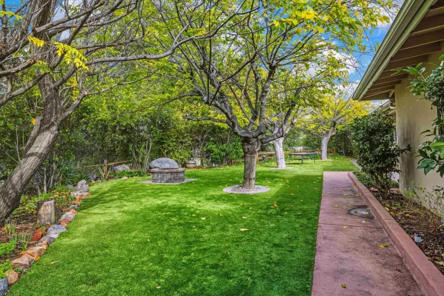 a view of a street with a building in the background