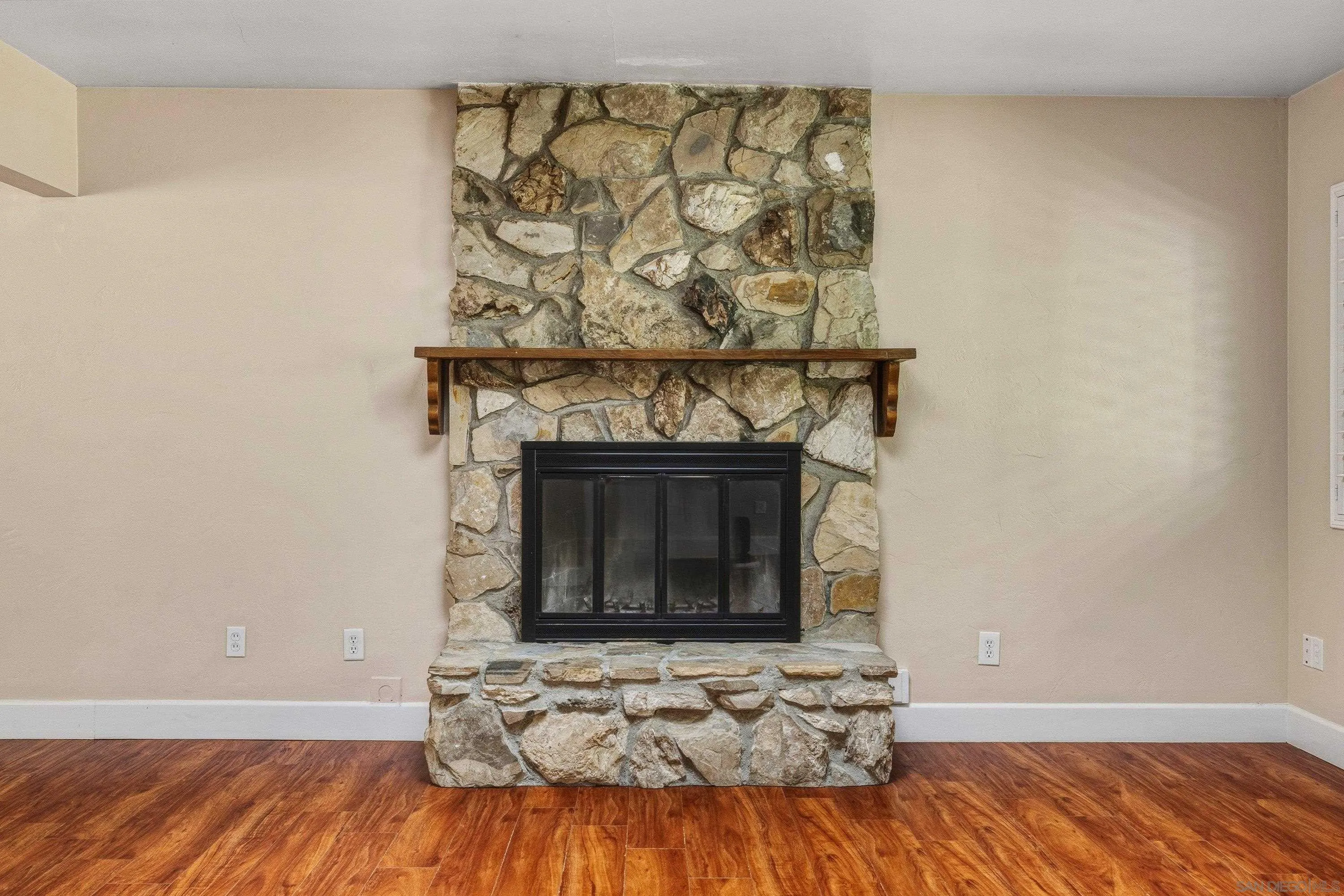 1491 Louise Drive Alpine, CA 91901 - Photo 10 of 45 a living room with a fireplace