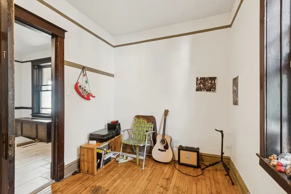 a workspace with furniture and wooden floor
