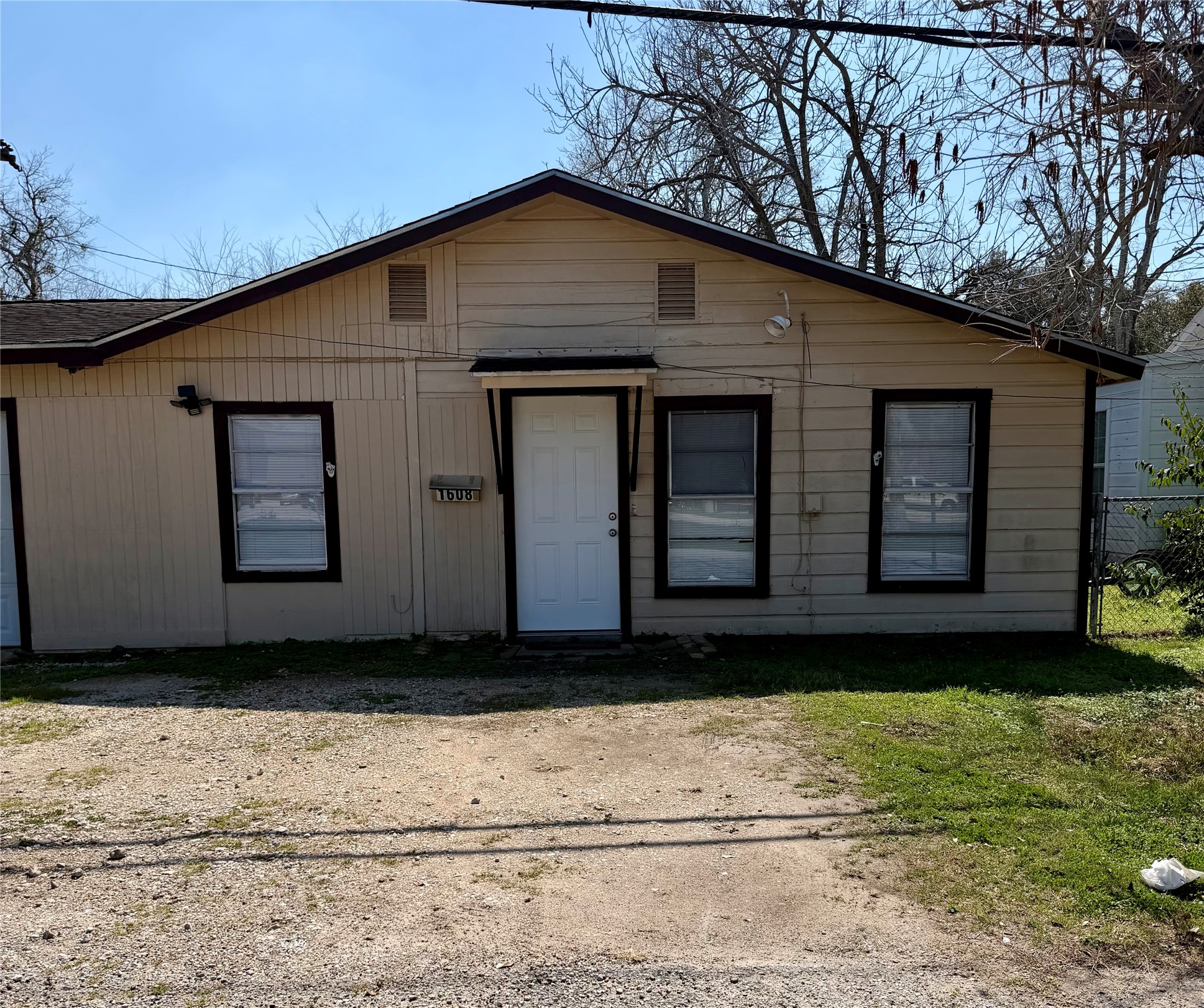 1608 Dyer Avenue Rosenberg, TX 77471 - Photo 1 of 16 a front view of a house