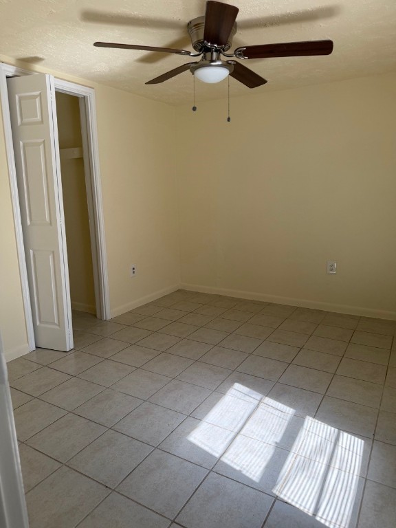 1608 Dyer Avenue Rosenberg, TX 77471 - Photo 12 of 16 en empty room with windows