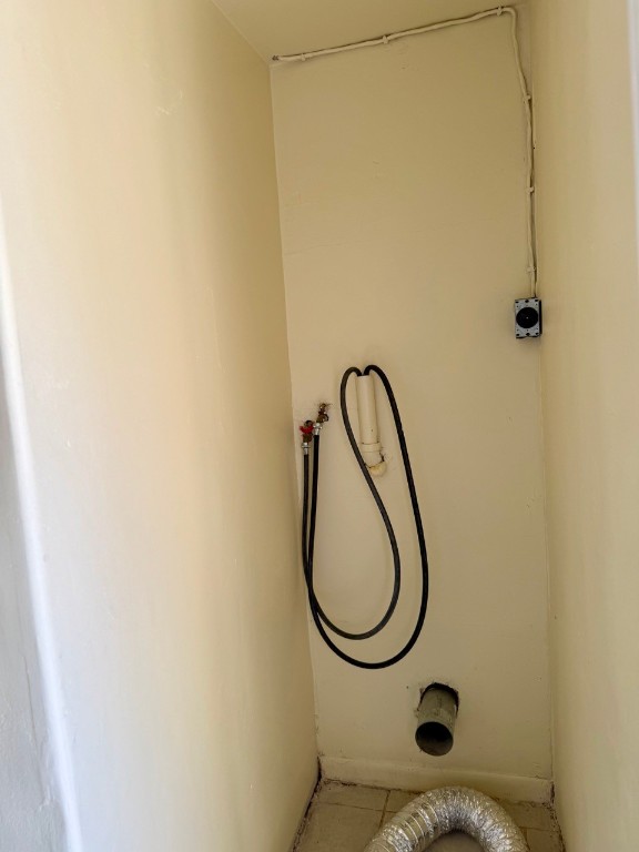 1608 Dyer Avenue Rosenberg, TX 77471 - Photo 14 of 16 a picture of a bathroom with a sink and a mirror