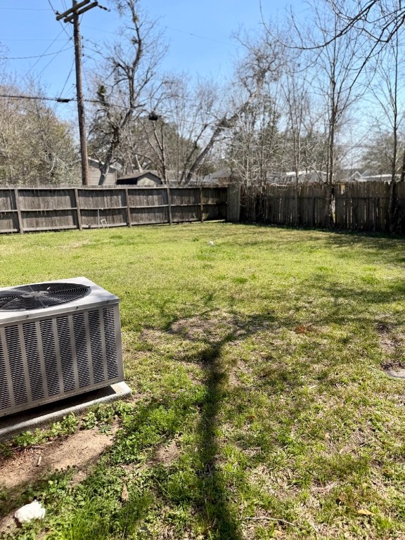 1608 Dyer Avenue Rosenberg, TX 77471 - Photo 15 of 16 a view of a yard with a large tree