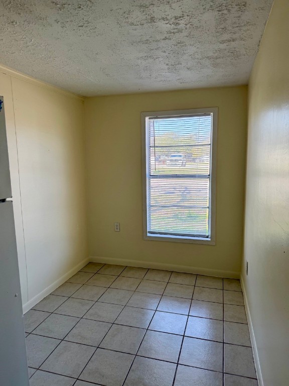 1608 Dyer Avenue Rosenberg, TX 77471 - Photo 6 of 16 a view of an empty room and window